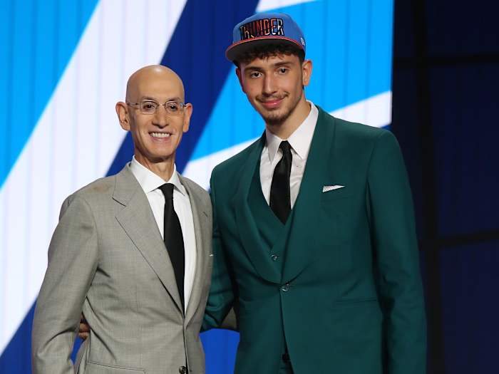 Alperen Sengun (Besiktas, Turkey) poses with NBA commissioner Adam Silver after being selected as the number sixteen overall pick by the Oklahoma City Thunder in the first round of the 2021 NBA Draft